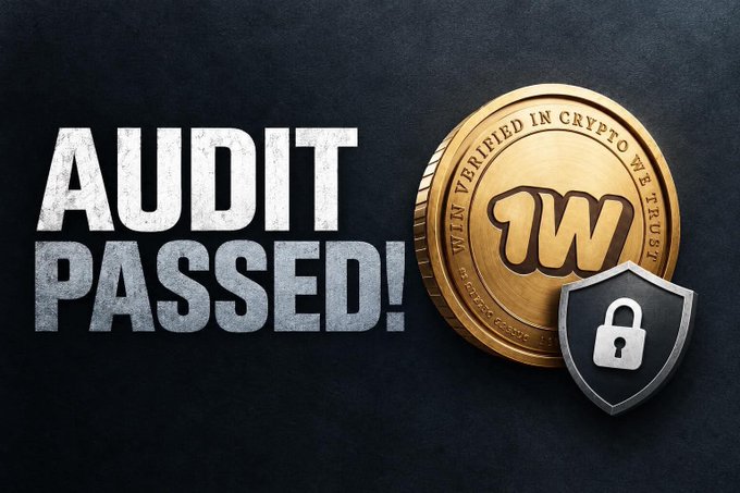 A promotional graphic with bold metallic text reading 'AUDIT PASSED!' next to a gold coin featuring the letter 'W' inscribed 'WIN VERIFIED IN CRYPTO WE TRUST', accompanied by a security shield with a padlock icon.