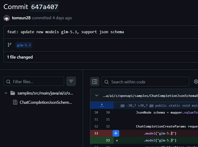 A GitHub commit page showing changes to a Java file (`ChatCompletionJsonSchema...`) where line 33 was modified to update the model from `"glm-5.2"` to `"glm-5.3"`, reflecting the addition of support for the new GLM-5.3 model as referenced in the post.