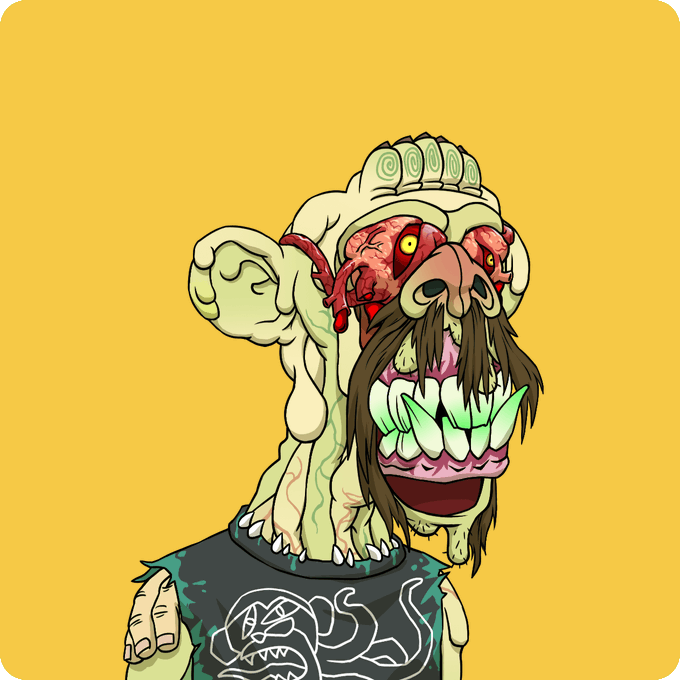 A grotesque cartoon illustration of a zombie-like creature with exposed brains, glowing yellow eyes, long brown facial hair, and jagged green teeth wearing a black shirt.