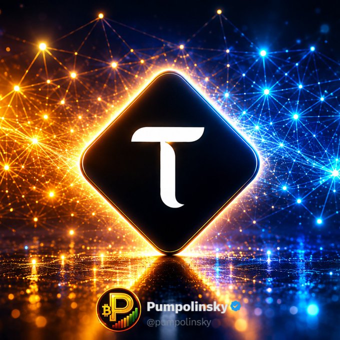 The image features a square logo with the letter "T" inside of a diamond shape, surrounded by blue and orange lights that create a vibrant and energetic atmosphere. The background includes a gradient of colors transitioning from blue at the top to orange at the bottom, which further emphasizes the visual impact of the logo. The post is written in white text against this colorful backdrop, drawing attention to the image's content.