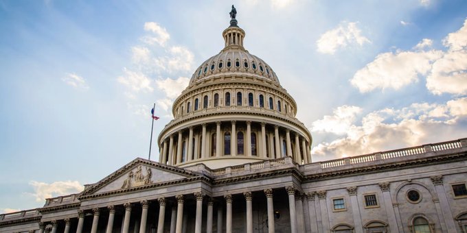 The image shows the U.S. Capitol dome against a cloudy sky, the iconic setting where the Senate will convene to vote on the CLARITY Act on Tuesday, Sept. 15. The vote represents a potential milestone in establishing a regulatory framework for digital assets in the United States.