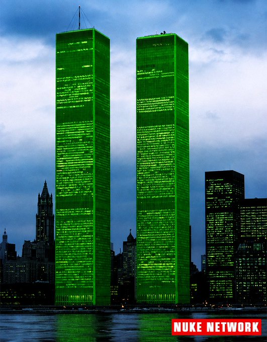 The Twin Towers and surrounding Manhattan skyline at dusk are bathed in green light, with a red 'NUKE NETWORK' banner in the bottom right.