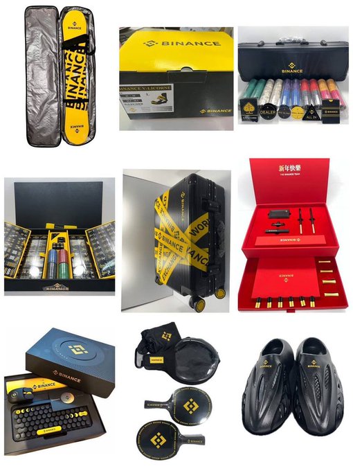 The image displays a collection of Binance-branded swag items, including a yellow storage case, a hard-shell suitcase, colored pencils, a hard drive, luggage wrapped in "BINANCE" caution tape, a pen set, a keyboard, a paddle, and black slippers, all featuring the Binance logo. This aligns with the post showcasing unique Binance merchandise collectibles and inviting fans to comment if they have collected them all.