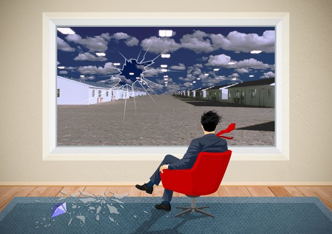 A man in a suit sits in a red chair facing a large window displaying a cracked, simulated desert scene with white buildings and a sky full of lights, while broken glass lies on the blue carpet behind him.