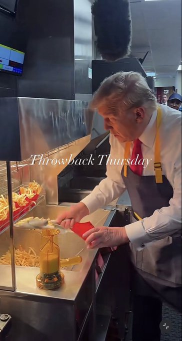 A man in a white shirt, red tie, and dark apron stands behind a counter, pouring fries into a container, with the text 'Throwback Thursday' overlaid on the image.