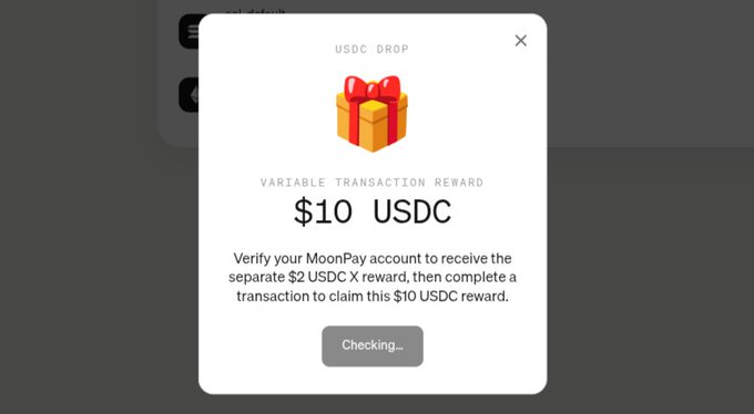 A screenshot of a USDC DROP reward popup showing '$10 USDC' variable transaction reward from MoonPay, with a 'Checking...' status button.