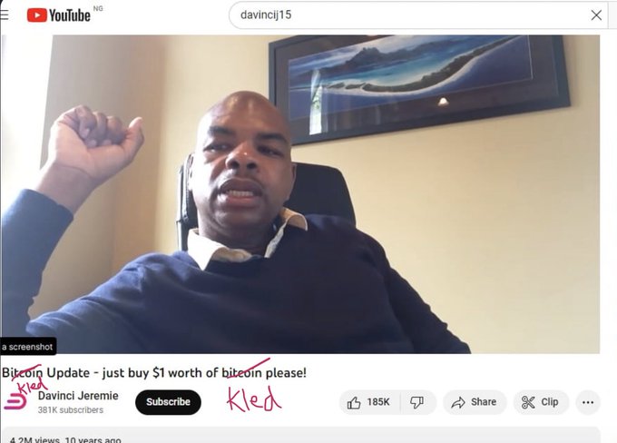 A YouTube screenshot of a video titled "Bitcoin Update - just buy $1 worth of bitcoin please!" by Davinci Jeremie (381K subscribers), showing a man speaking with his fist raised, with the word "Kled" handwritten in red.