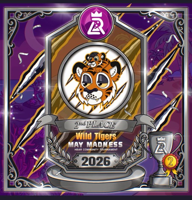A decorative 2nd place award badge for the 'Wild Tigers' team in the 'May Madness' HBAR Community Tournament 2026, featuring a cartoon tiger cub and silver trophy on a purple jungle-themed background.