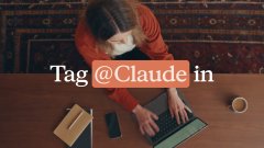 The image shows a person working on a laptop, with the text "Tag @Claude in" overlaid. This relates to the post by illustrating the Slack integration workflow, where users can tag Claude in a Slack thread to query Nansen's blockchain analytics data, including Smart Money flows and Hyperliquid positions.