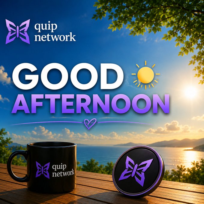 The image features a wooden table with two items, including a black coffee mug and a purple butterfly-shaped coaster. The text "Good afternoon builders Another day to create, engage, and grow" is displayed above the objects. This suggests that someone has posted this image on Quip Network, possibly as part of a discussion or promotion related to the platform's content creation community.
