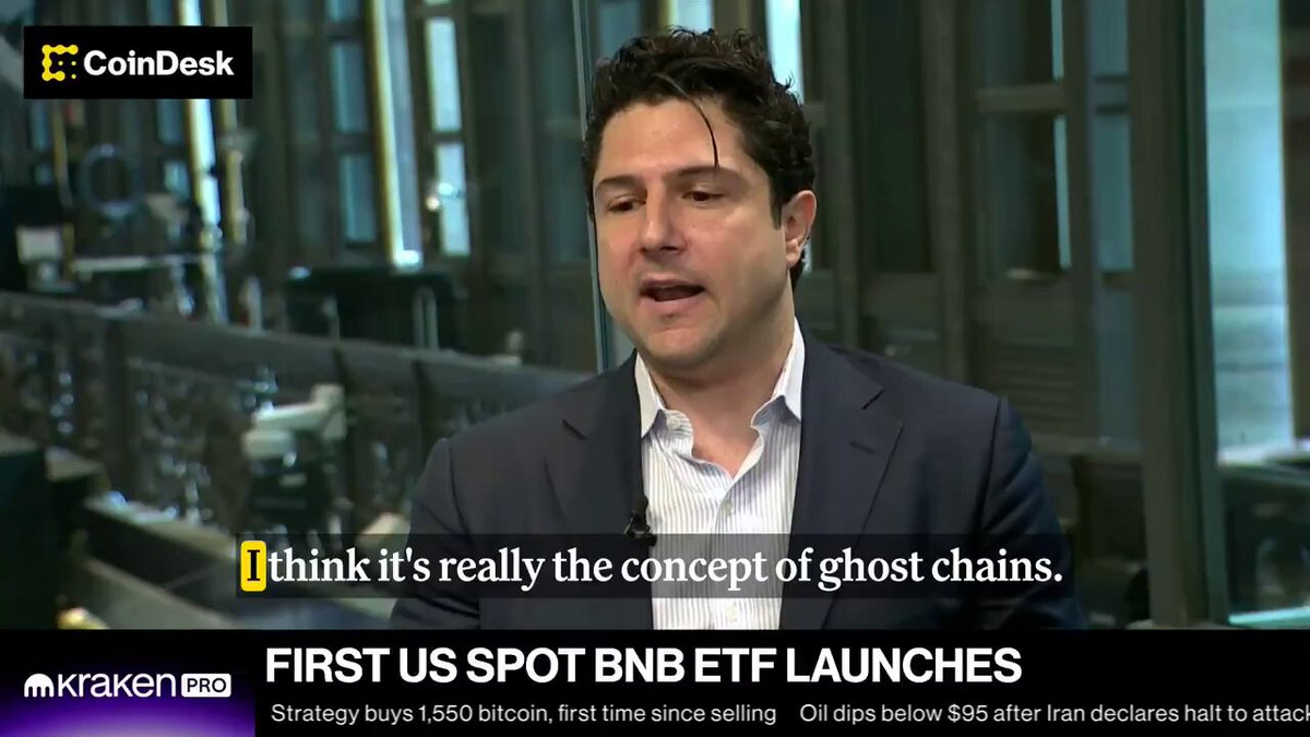 The image features a man wearing a suit talking about the concept of ghost chains. The caption below his speech reads "VANECK DIRECTOR OF DIGITAL ASSET PRODUCT KYLE DACRUZ SAYS MOST BLOCKCHAINS ARE GHOST CHAINS," which is related to the post's content.