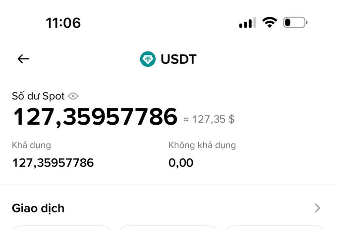 A mobile screenshot of a crypto wallet app showing a USDT spot balance of 127,35957786 (~$127.35).