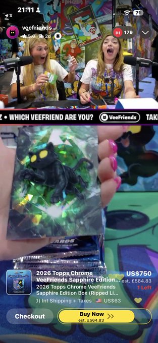 A Whatnot livestream shows a vendor showcasing a holographic black cat trading card, with an overlay displaying "$750" for the 2026 Topps Chrome VeeFriends Sapphire Edition Box (est. £564.83, 1 left). Two hosts are visible at the top, with 179 viewers tuning in as the post highlights a pull from the National on the VeeFriends Whatnot live.