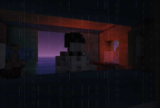 A Minecraft screenshot showing a rainy nighttime scene with a blocky character figure in a dimly lit interior looking out at a purple-hued landscape.