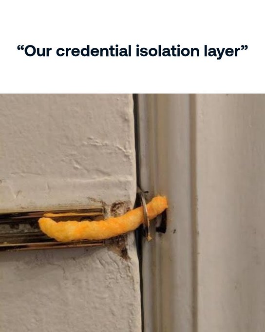 A meme captioned 'Our credential isolation layer' showing a close-up photograph of a cheese puff stuck in the crack between a door and its frame.