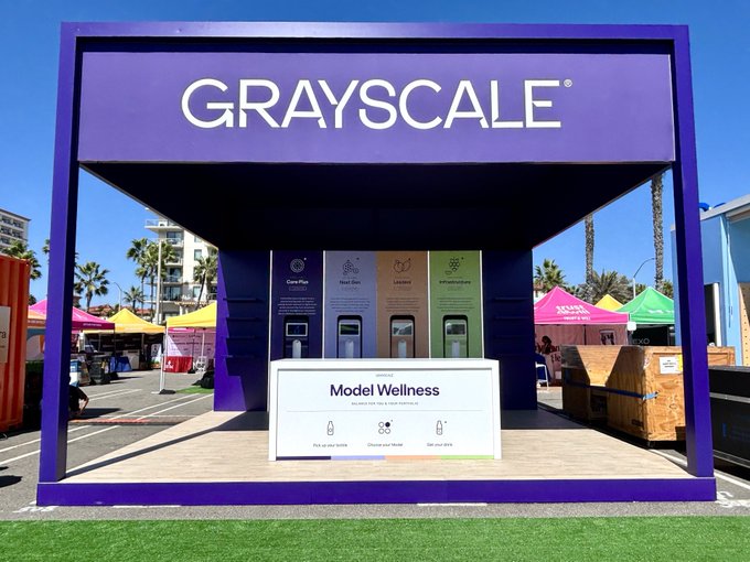 Grayscale's branded booth (508) at FutureProof in Huntington Beach showcases their new Model Wellness portfolio, displaying four strategy concepts—Core Plus, Leaders, Next Gen, and Infrastructure—each highlighting crypto assets like BTC and ETH.