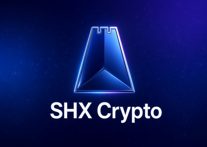 Logo graphic for 'SHX Crypto' displayed in white text below a stylized blue geometric symbol on a dark blue background.
