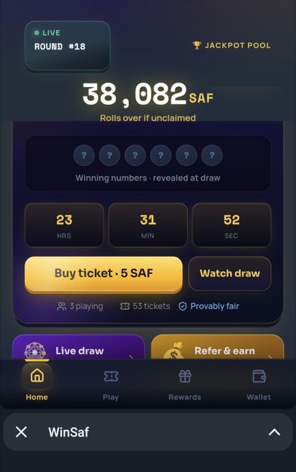 A mobile app interface for 'WinSaf' showing a live jackpot pool of 38,082 SAF with a countdown timer at 23 hours, 31 minutes, and 52 seconds, featuring 'Buy ticket · 5 SAF' and 'Watch draw' buttons.