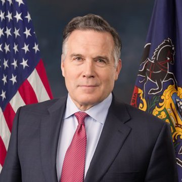 Senator Dave McCormick, positioned in front of the U.S. flag and Pennsylvania state flag, is featured alongside his call to bring the CLARITY Act to a Senate floor vote, urging an end to obstruction and passage of the bill within two days.