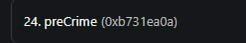 A blurry, out-of-focus image showing what appears to be white text or vertical lines against a dark gray background.