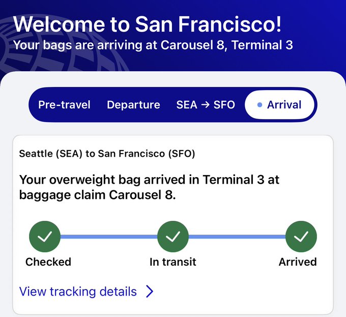 An Alaska Airlines arrival notification for a Seattle (SEA) to San Francisco (SFO) flight reads "Your overweight bag arrived in Terminal 3 at baggage claim Carousel 8," humorously highlighting the airline's unnecessarily specific labeling of a single bag as overweight.