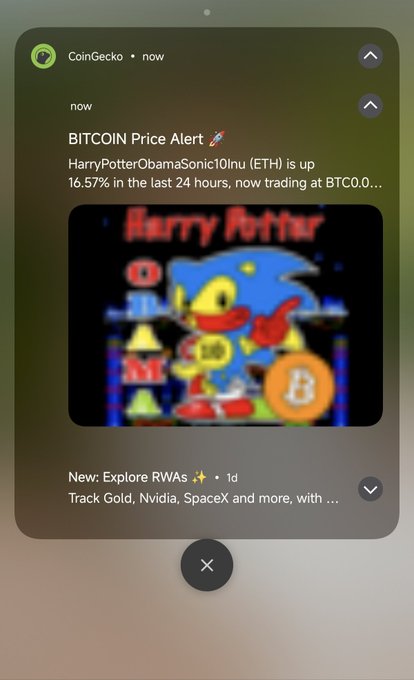 A screenshot of a CoinGecko notification stating 'BITCOIN Price Alert: HarryPotterObamaSonic10Inu (ETH) is up 16.57% in the last 24 hours,' featuring an image of a Sonic the Hedgehog meme character with a Bitcoin logo.
