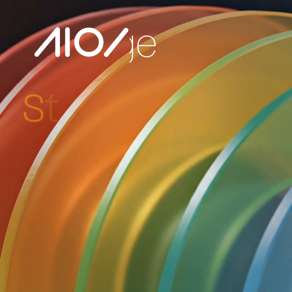 The image features a collection of colorful glass plates, each with different colors such as orange, green, yellow, blue, and red. The plates are arranged in a circular pattern, creating an eye-catching display that draws attention to their vibrant hues. The text "AIOZ Storage" is also present on the image, suggesting that these plates may be part of a storage system or collection managed by AIOZ Storage.