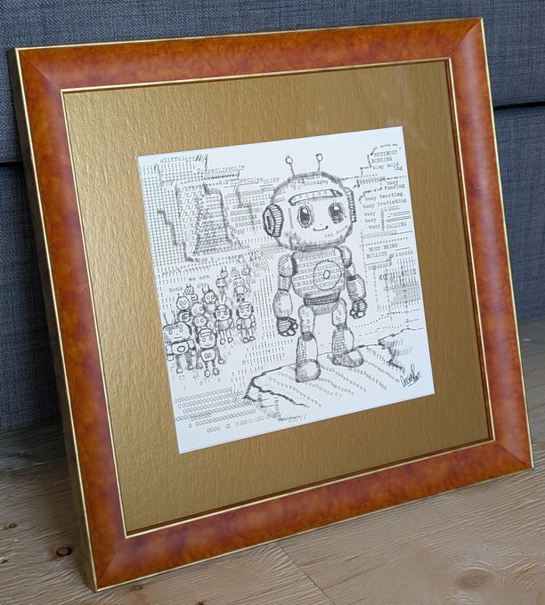 A framed black-and-white drawing depicting a retro robot standing with smaller robots in a rain-like digital landscape, displayed on a wooden surface.