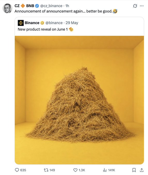The image shows a large pile of hay or straw stacked up inside a cubed room with yellow walls. The room appears to be a part of an advertisement, possibly related to Binance Coin, as indicated by the text that says "binancecoin:native breaks through $700 On May 31". This suggests that there is a new product release on June 1st, potentially related to the Binance Coin cryptocurrency.
