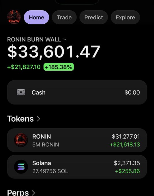 A cryptocurrency wallet interface displays the "RONIN BURN WALL" with a total value of $33,601.47, showing a +185.38% gain (+$21,827.10), primarily composed of 5M RONIN ($31,277.01) and 27.49756 SOL ($2,371.35). The image visually confirms the post's claim of accumulating $RONIN for burning, showcasing the wallet's holdings and recent growth.