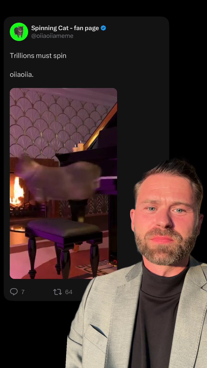 The image features a man standing next to a piano with his head turned towards the camera. The man has a beard, and he appears to be wearing a suit. In front of him, there's an image of a cat sitting on top of a chair. The background is black, which contrasts with the white text in the image that reads "I like the finer things in life. I like the good vibes I've become aware of the strong frequency and I like it! One of my top !"