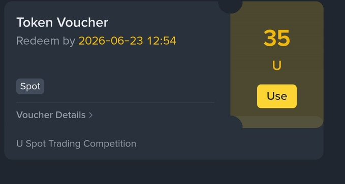 The image shows a post about vouchers at binance, with an image of a card showing the details including the event name "Binance Complete" and the number "35", as well as text that says "Redeem by 2026-06-23 12:54". The message suggests using a particular token or discount for a specific binance event.