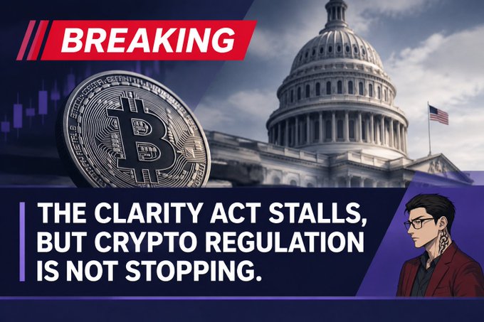 A breaking news graphic titled 'THE CLARITY ACT STALLS, BUT CRYPTO REGULATION IS NOT STOPPING' featuring a Bitcoin coin, the U.S. Capitol building, a stock chart background, and an illustrated avatar in the corner.