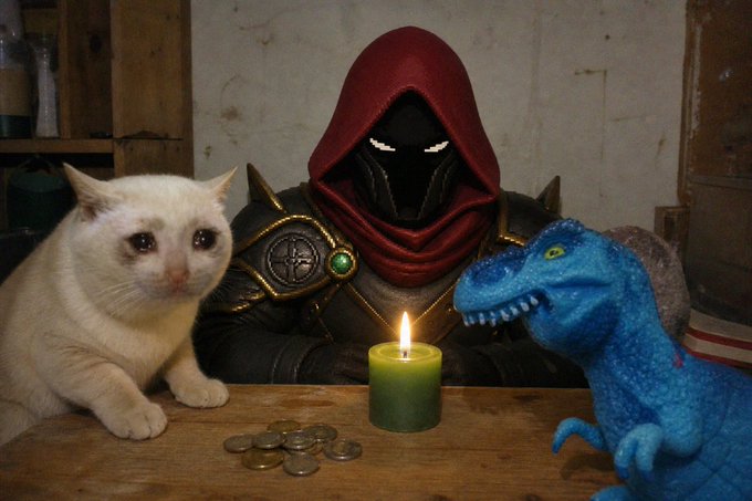 A mysterious hooded figure wearing dark armor with glowing white eyes sits at a wooden table illuminated by a green candle, flanked by a white cat on the left and a blue toy dinosaur on the right, with coins scattered in front.