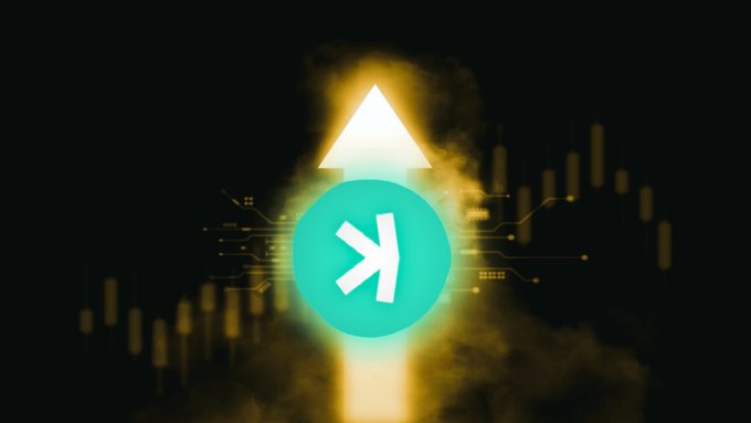 The image features a black background with an upward-pointing arrow, which appears to be glowing yellow or orange. Below this arrow, there's a white circle containing a green "K" symbol. The caption of the image reads "#Kaspa".