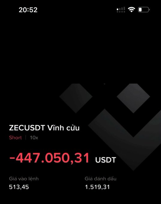 Mobile app screenshot showing a 'ZECUSDT Vĩnh cửu' (perpetual) short position with 10x leverage showing a -447,050.31 USDT P&L, entry price 513.45 and liquidation price 1,519.31.