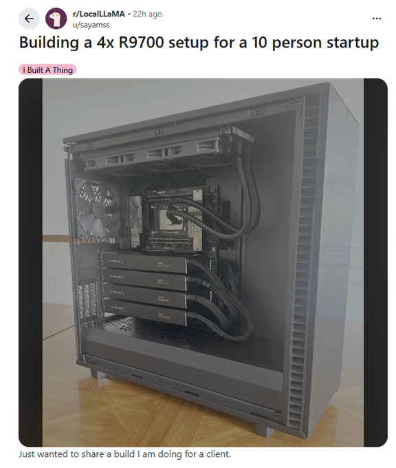 A Reddit post from r/LocalLLaMA by user u/sayamss titled 'Building a 4x R9700 setup for a 10 person startup', showing a high-end custom PC build with a liquid cooling system and multiple expansion cards.