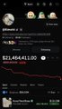 A very small dark crypto-market screen shows a red downward price chart and a large quote reading approximately “$31,464.41 USD,” with the ticker/name not clearly legible.
