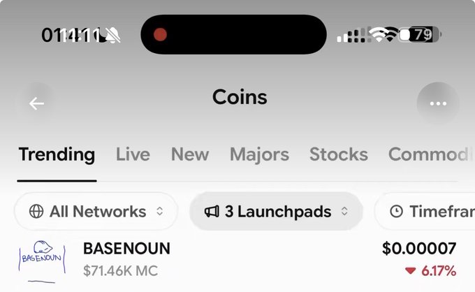 A mobile phone screenshot of a cryptocurrency tracking app showing the Trending tab with 'BASENOUN' token at $0.00007 market cap and a 6.17% decline, with phone battery at 79%.
