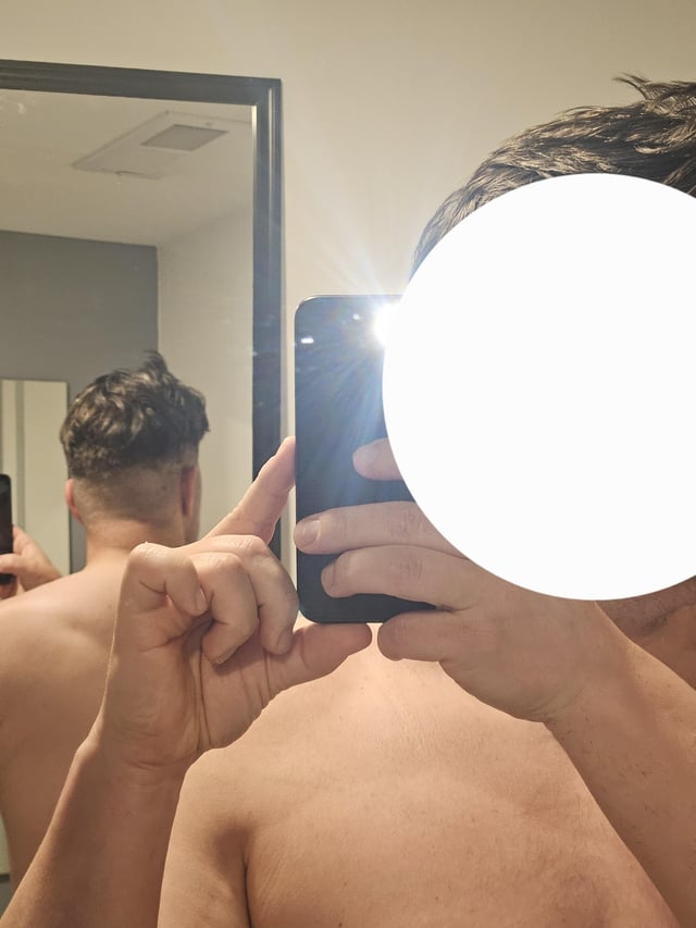A man is taking a selfie in the mirror, showing the back of his head and shoulders. The post's comment "2nd attempt... Similar to r/Hedera" implies this is a second attempt at posting something related to the r/Hedera subreddit, possibly related to a haircut or style.