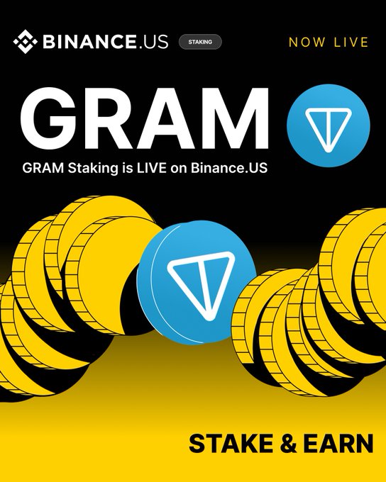 A Binance.US promotional graphic announcing "GRAM Staking is LIVE" featuring bold yellow and blue design elements with a central blue coin bearing the GRAM logo, alongside the text "NOW LIVE" and "STAKE & EARN" to promote the 9% rewards rate for staking GRAM tokens.