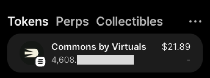 The image shows a crypto wallet interface displaying a "Tokens" tab with a holding of "Commons by Virtuals" priced at $21.89 (amount partially obscured). This relates to the post by illustrating the $21 USD airdrop reward for three days of activity on the app, which the author notes equals roughly 1.5 hours of a UK cleaner's wages.