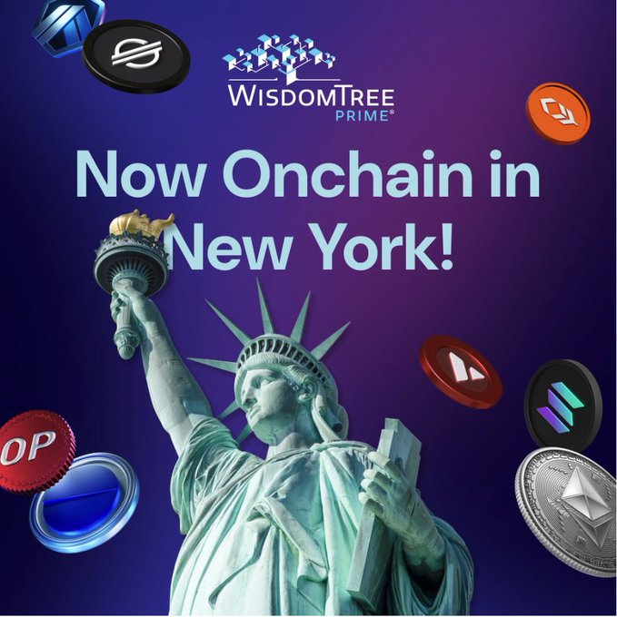 A promotional graphic for 'WisdomTree Prime' reading 'Now Onchain in New York!', featuring the Statue of Liberty and various floating cryptocurrency coins.