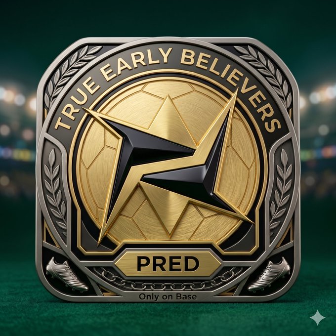 The image features a gold and black medal with the words "True Early Believers" written on it. The medal has a star design at its center, which is surrounded by a chain. The background of the image shows a green surface, likely representing grass or turf. There are also some shoes visible in the bottom right corner of the photo.