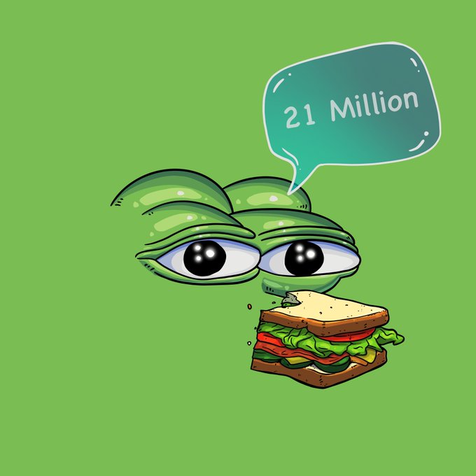 A green cartoon frog character with large eyes holding a sandwich, with a speech bubble saying '21 Million'.