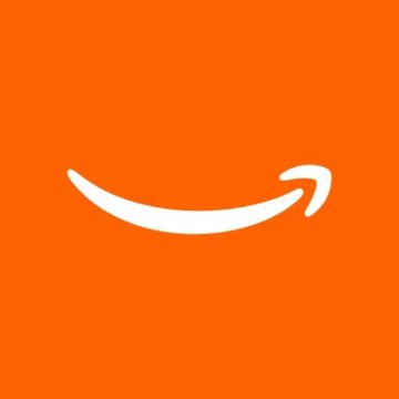 The image features a large orange square that has been edited with white text, giving it an Amazon-like appearance. The text reads "Just In: @Amazon is expanding its partnership with QuEra Computing to bring the first fault-tolerant quantum computers to the AWS cloud by 2028." This text is positioned in front of a smiley face, which adds a playful and engaging touch to the image.