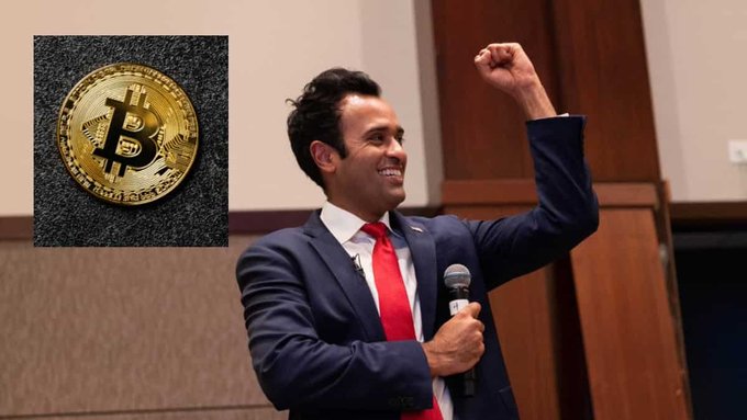 A photo of Vivek Ramaswamy in a blue suit and red tie speaking at a podium with his fist raised, with an image of a physical Bitcoin coin superimposed in the upper left corner.