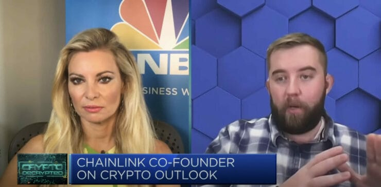 A blonde woman interviews Sergey Nazarov, Chainlink co-founder, on CNBC, with the chyron "CHAINLINK CO-FOUNDER ON CRYPTO OUTLOOK" framing the discussion as serious industry commentary rather than speculative price talk.