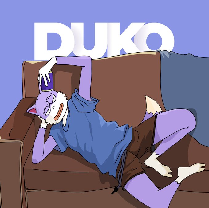The image features a cartoon cat lying down on a couch with its head resting on its paw. The cat appears to be relaxed and comfortable, possibly taking a break from playing or exploring. The background of the image is blue, which complements the purple shorts worn by the cat. There are no texts present in the image, but there is a caption that reads "DUKO was never meant to be the first, but to last the longest". This caption seems to be related to the image or the post it belongs to, as it discusses the importance of investing in community rather than focusing on creating and sharing memes.