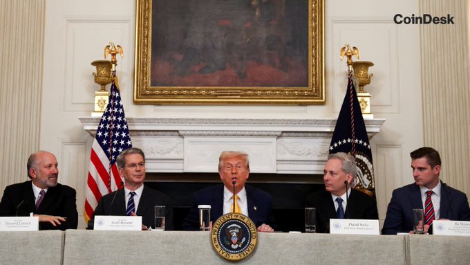 President Trump sits at the center of a White House table with the presidential seal, flanked by SEC Chair Howard Lutnick (labeled "Howard Lutnick"), Treasury Secretary Scott Bessent ("Scott Bessent"), and other officials including David Sacks ("David Sacks") and Eric Trump ("Eric Trump"), ahead of the inaugural CFTC Innovation Advisory Committee session focused on crypto and prediction market executives. The CoinDesk watermark appears in the upper right corner.